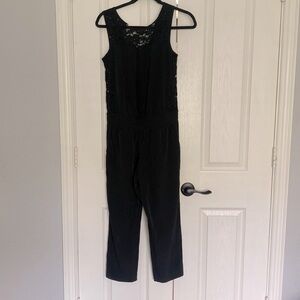 This is a size 0 lace jumpsuit from Express!